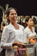 a person holding a plate of food