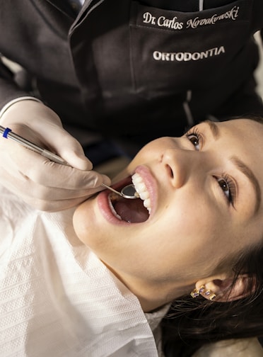 A woman getting a dental examination.