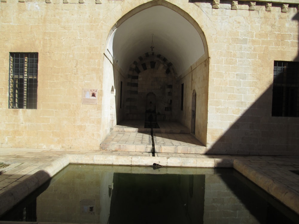 a pool in a brick building