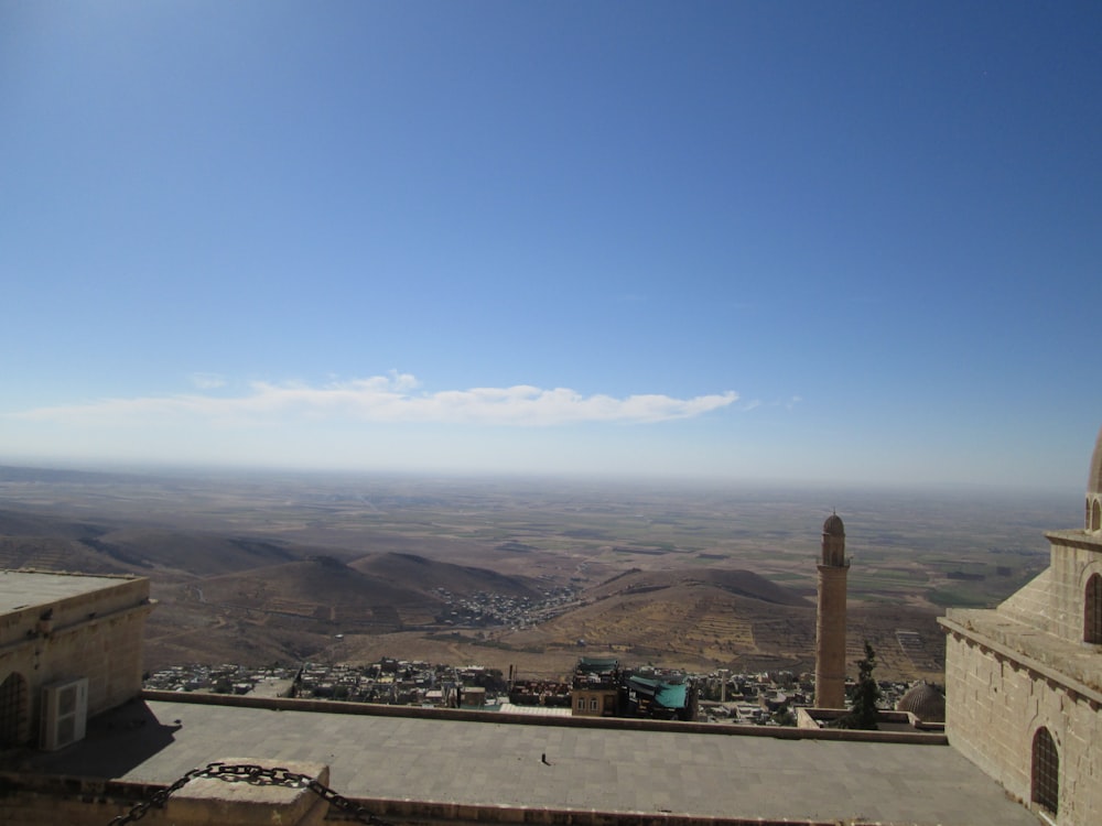 a city with a large hill in the background