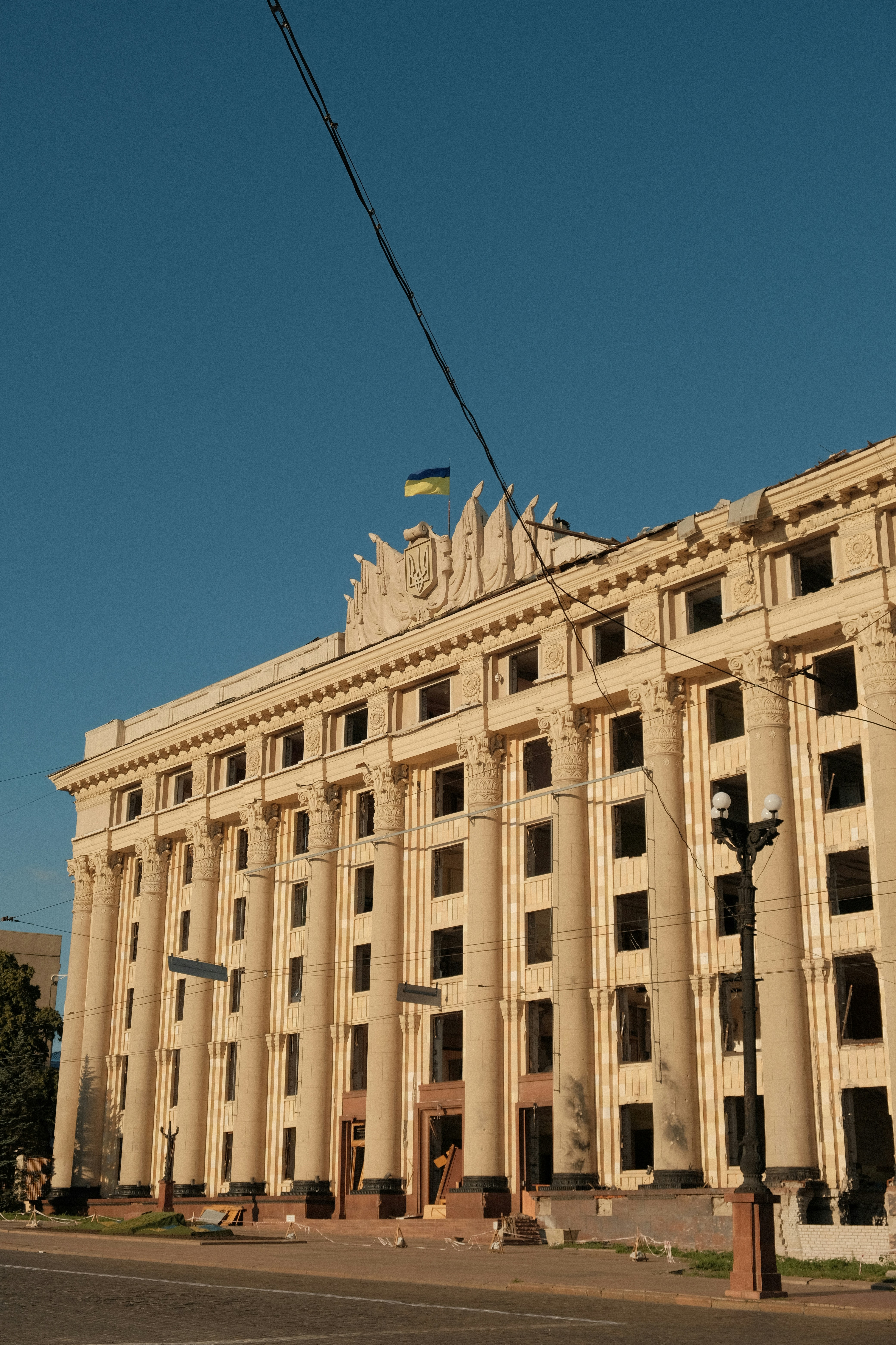a large building with a flag on top