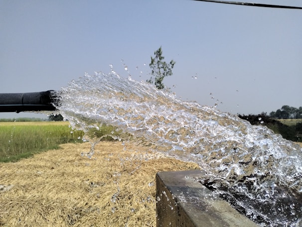 Technician extracting water from a commercial property after a pipe burst
