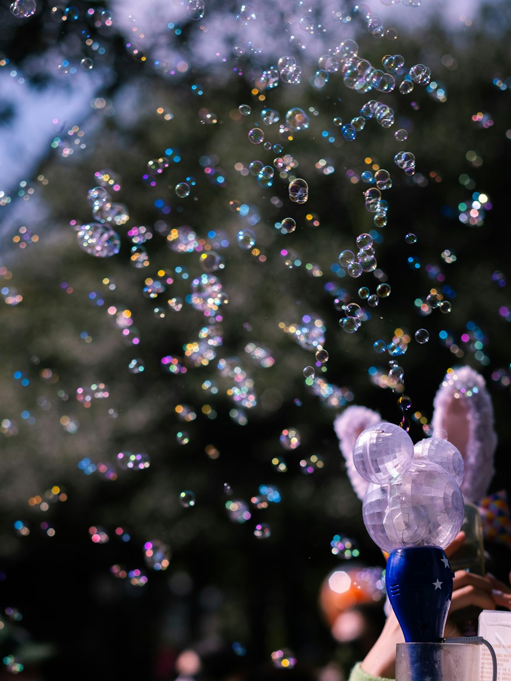 a person holding a purple object