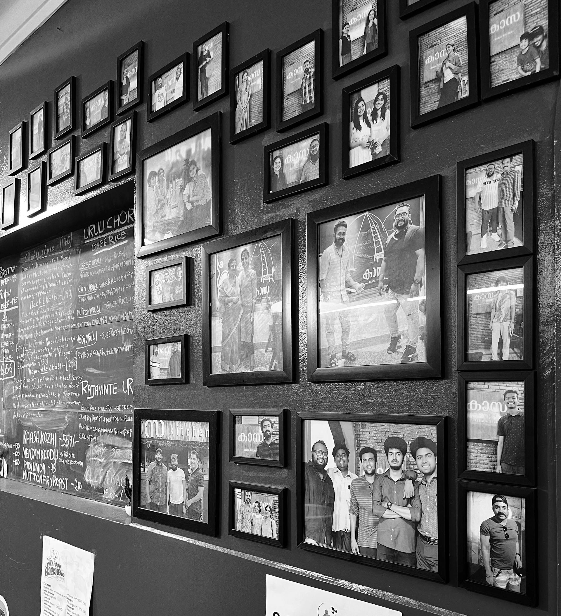 a wall with pictures on it