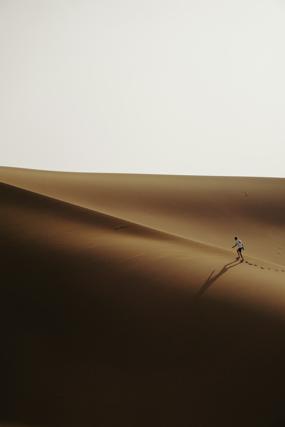 a person walking on a beach