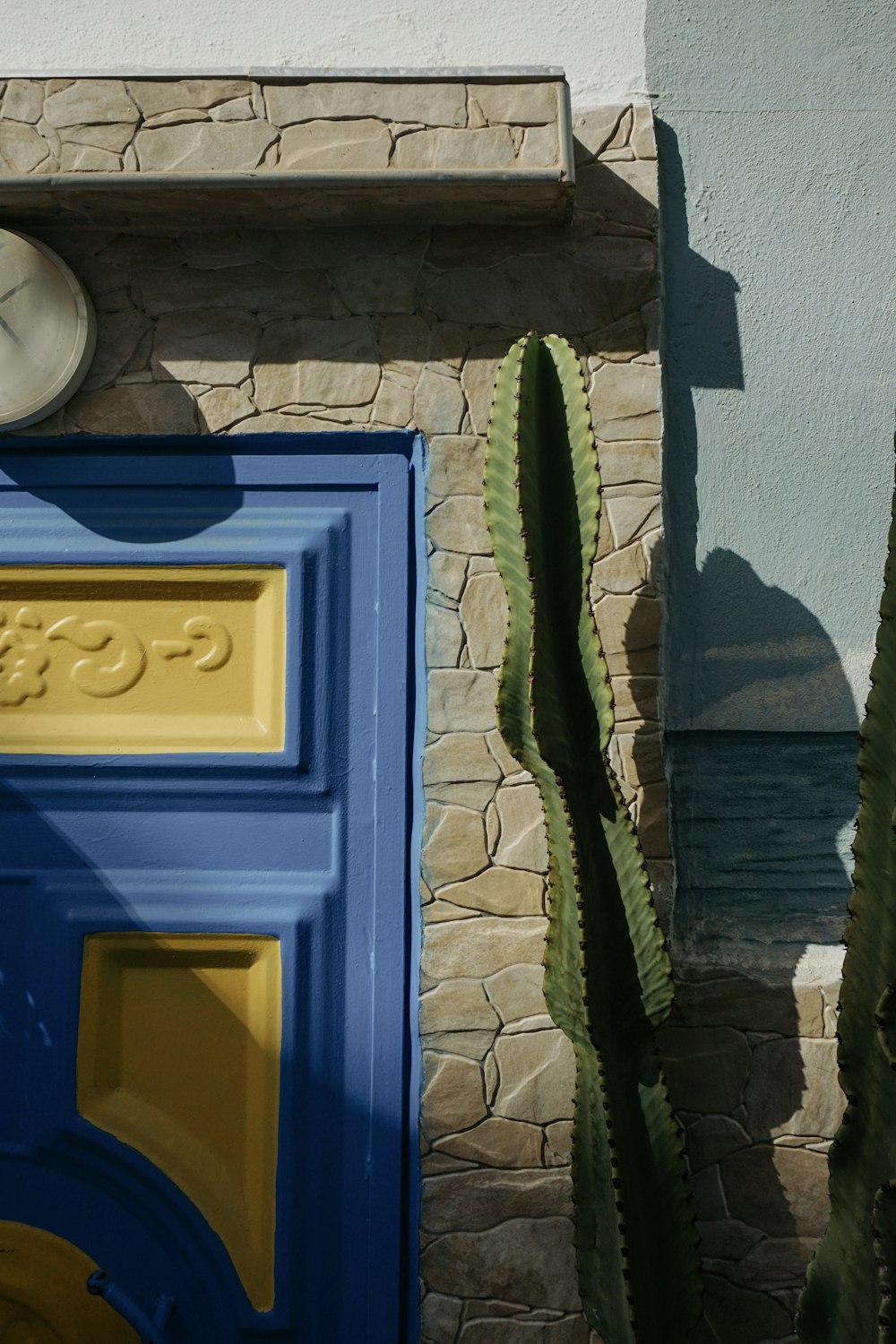 a blue box with a yellow door