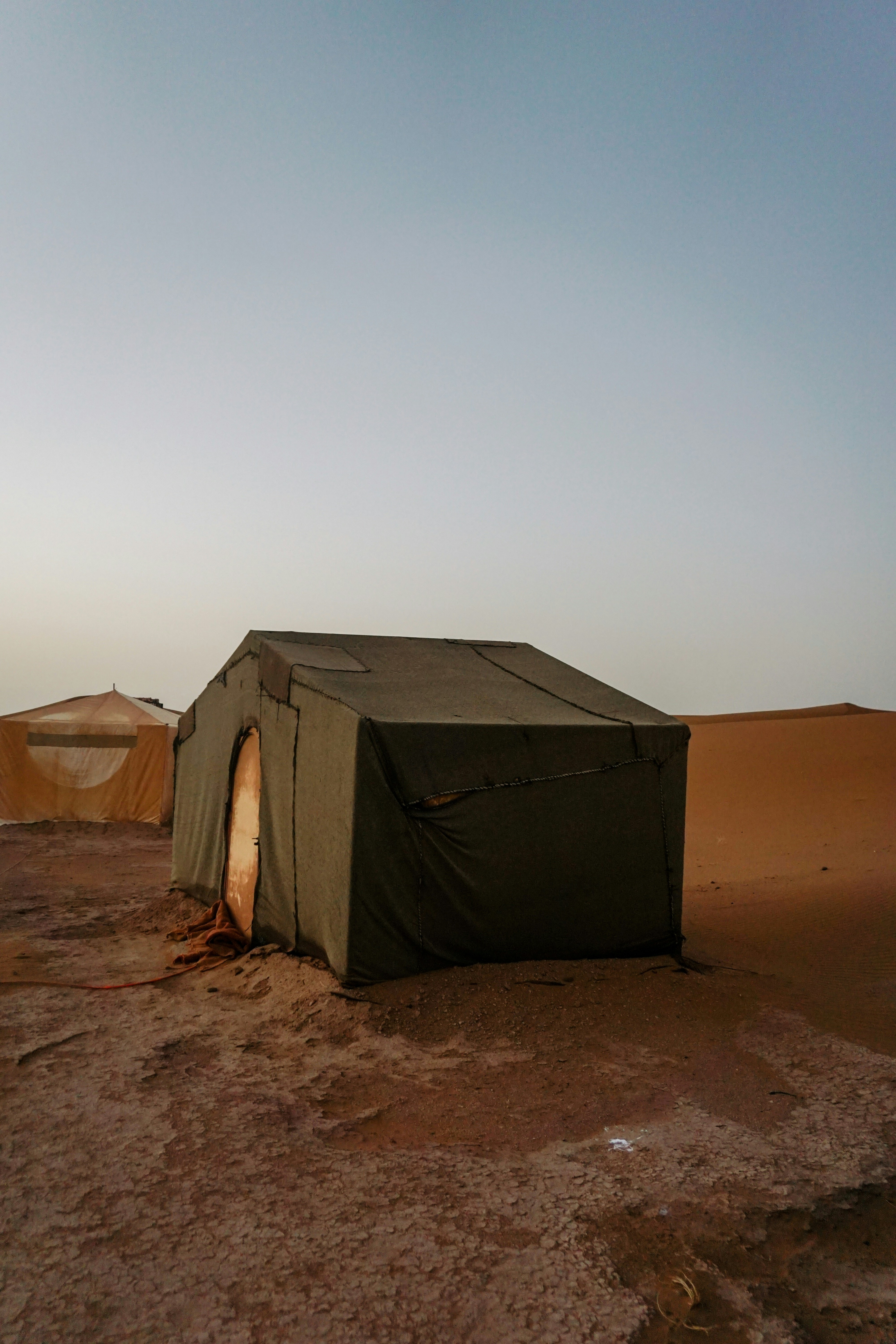 a group of tents in a desert