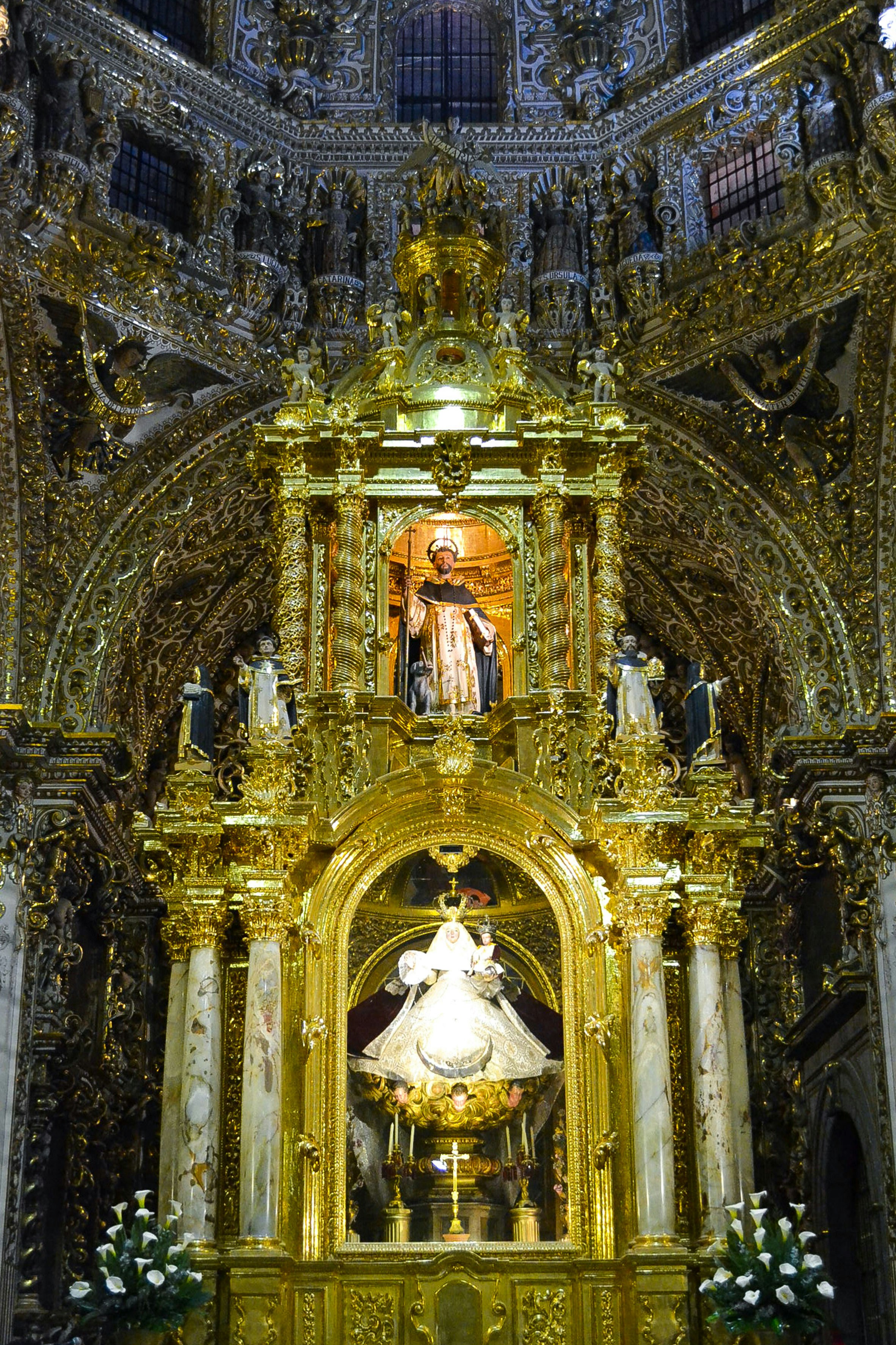 a golden statue in a building