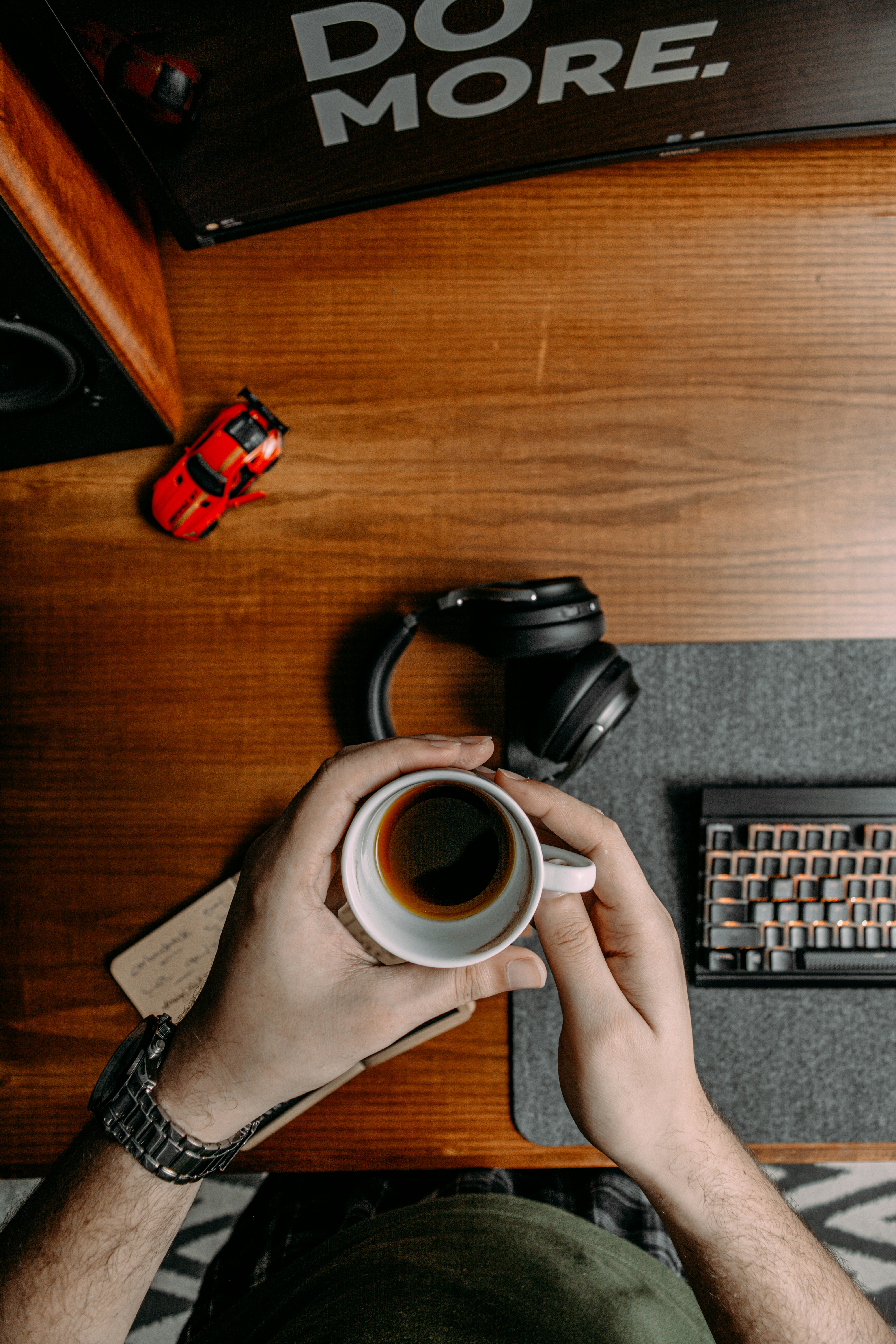 a person holding a cup
