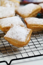 a group of pastries on a rack