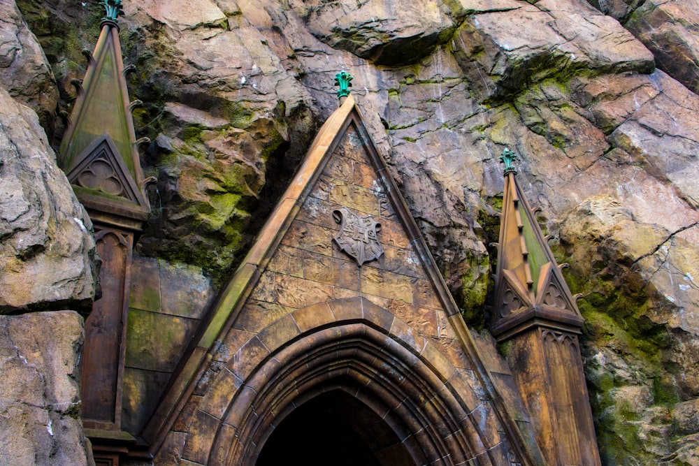 a stone building with steeples