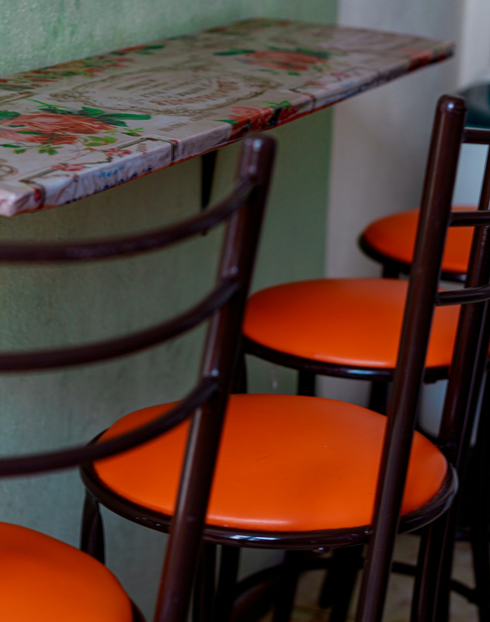 a group of orange chairs