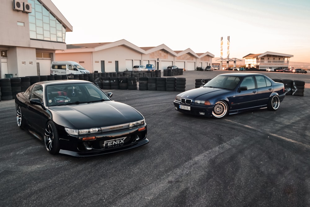 a couple of cars parked in a parking lot