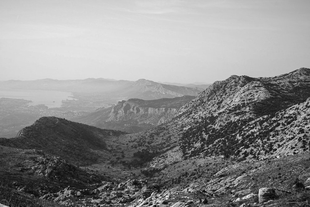 a mountain range with fog