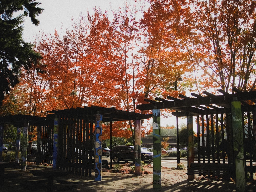 a gate with trees around it