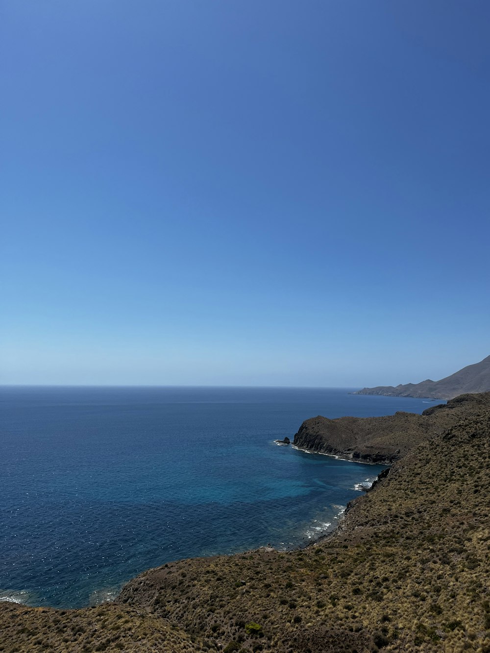 a body of water with land around it