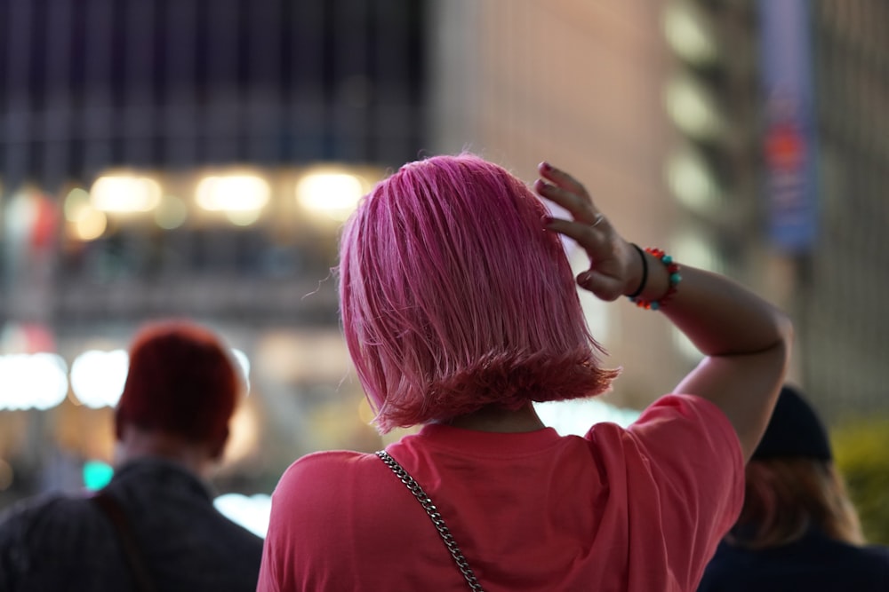 a person wearing a pink hat