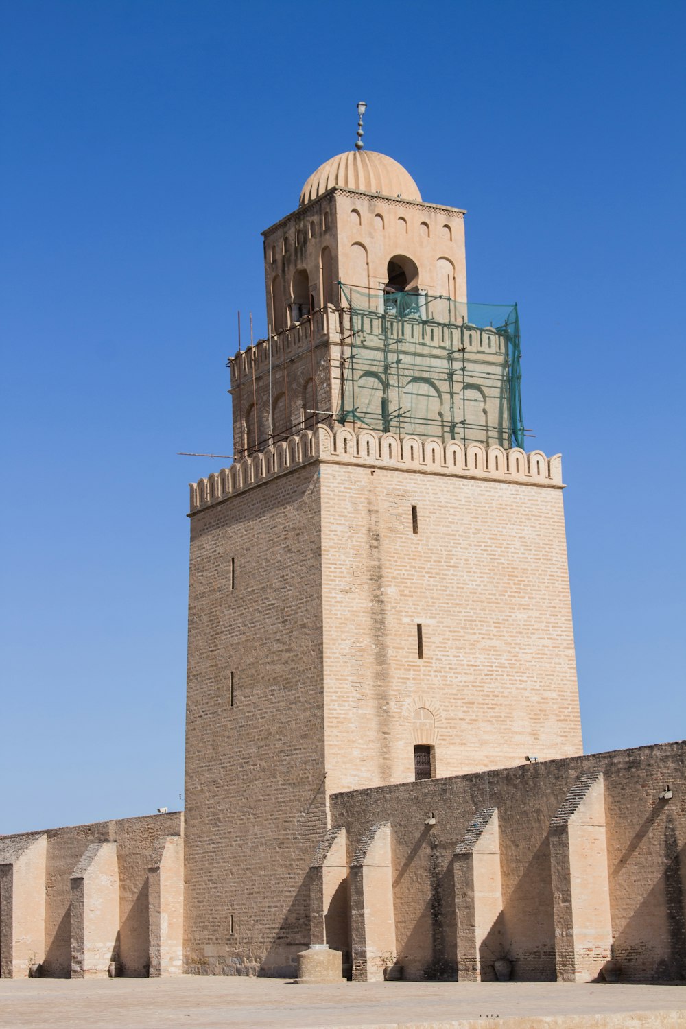 a large stone building with a domed roof