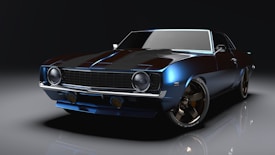 A sleek, vintage muscle car with a reflective black and blue finish and chrome accents, shown in a dimly lit environment. The car's design features a distinct angular shape with prominent front headlights and a wide grille, enhancing its classic and robust look.