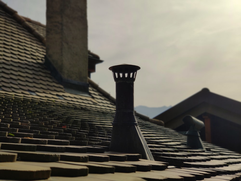 a stone roof with a chimney