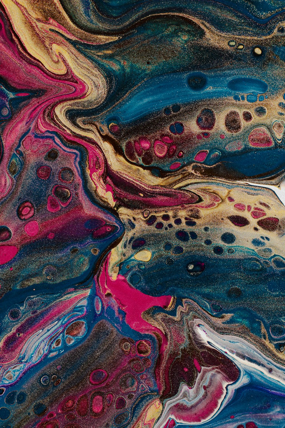 a close up of a colorful piece of art