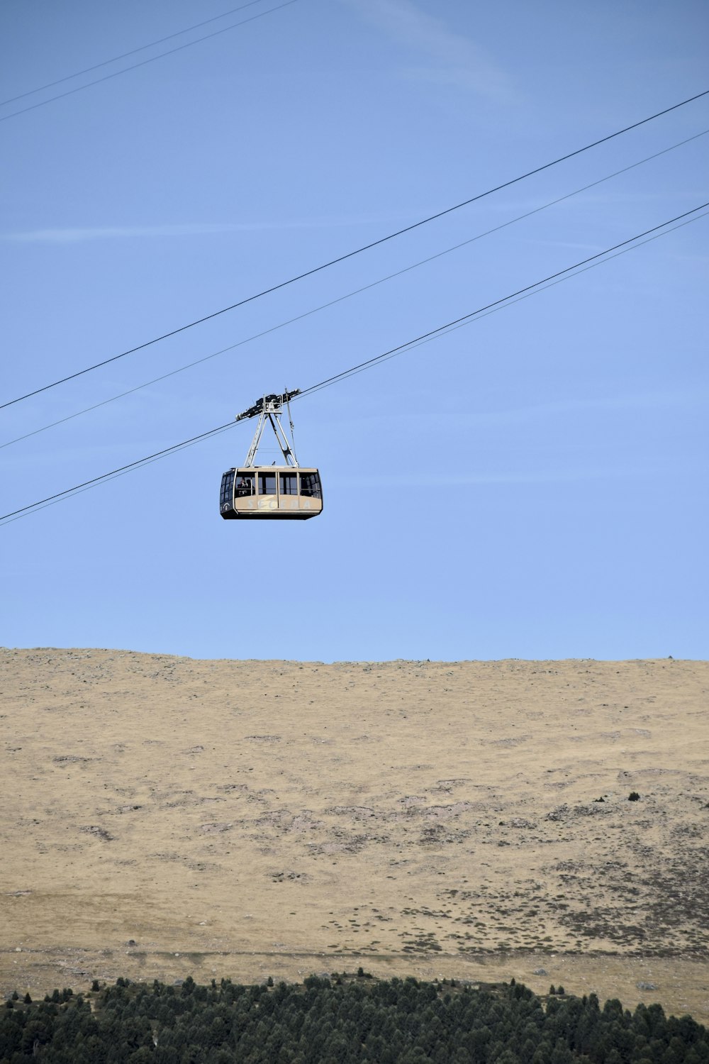 a cable car above a desert