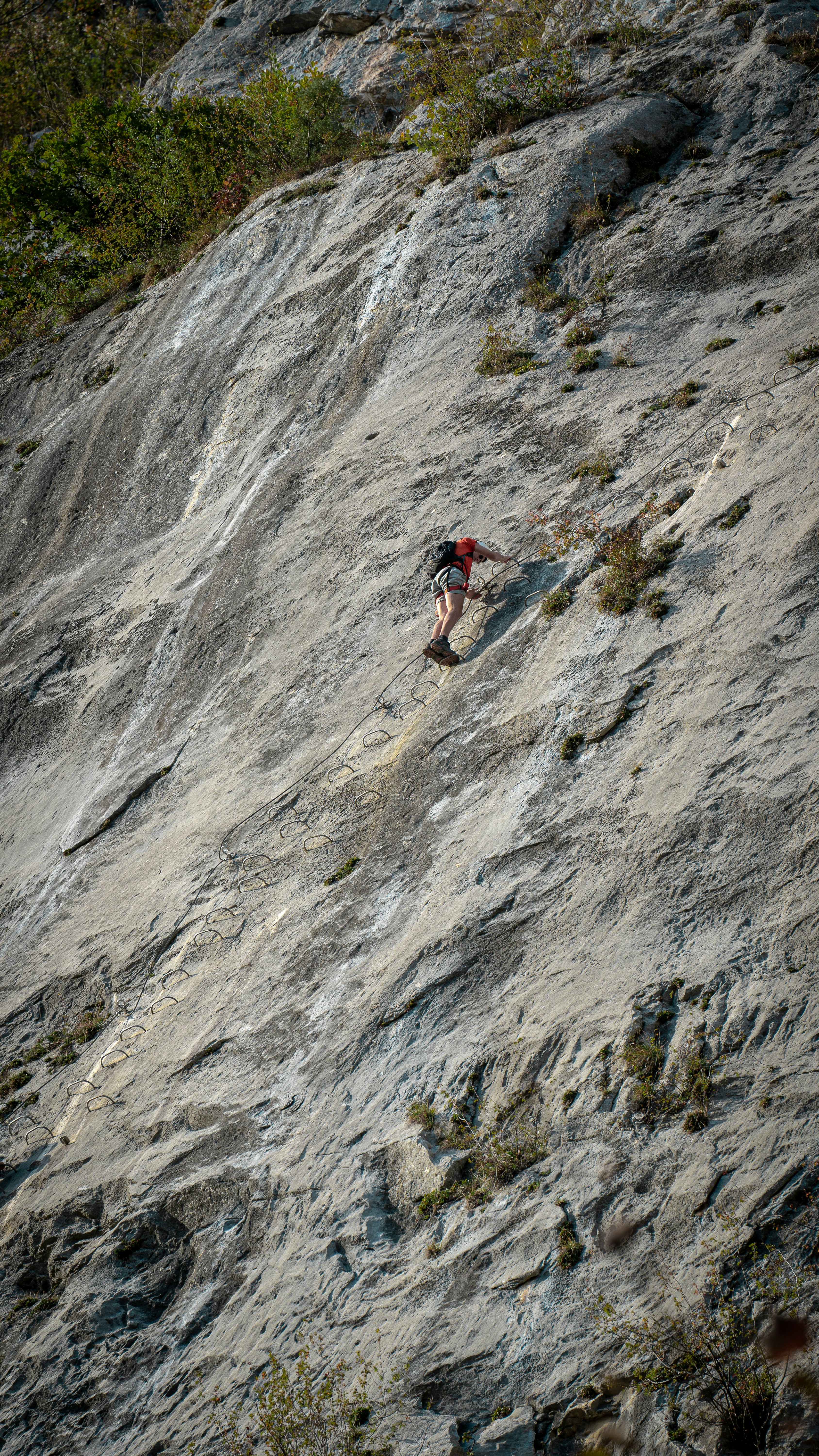 a person climbing a rock