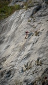a person climbing a rock
