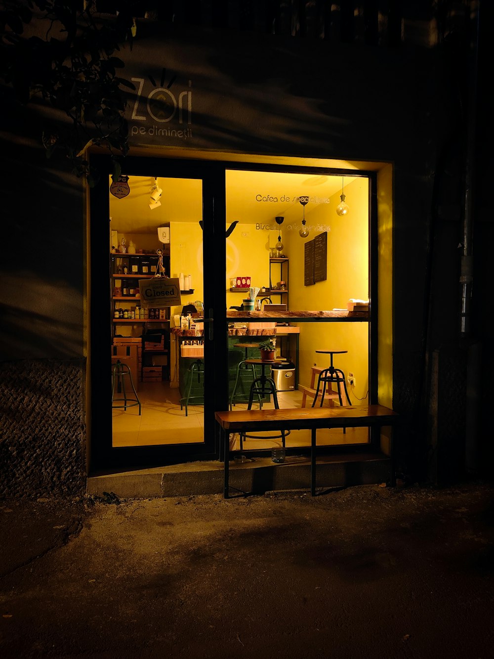 a small restaurant with a table and chairs