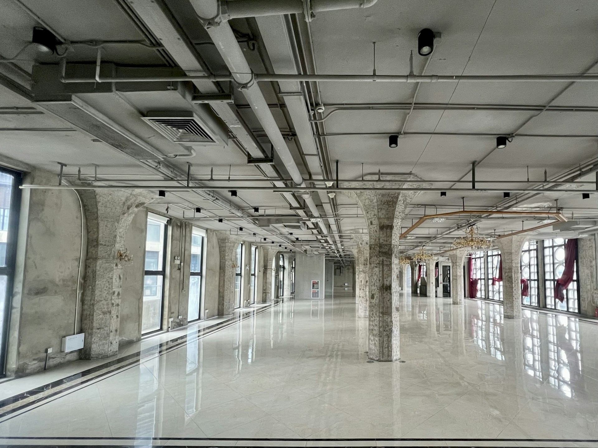 a long hallway with windows
