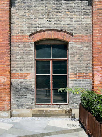 a window in a brick building