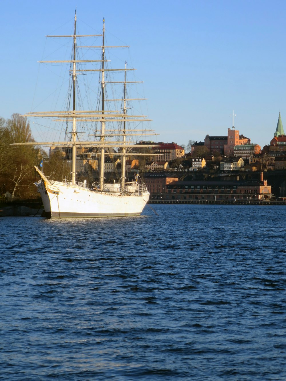 a large sailboat in the water