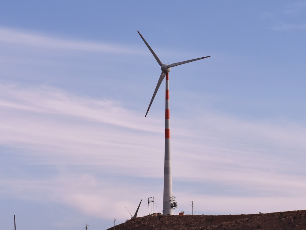 a windmill on a hill