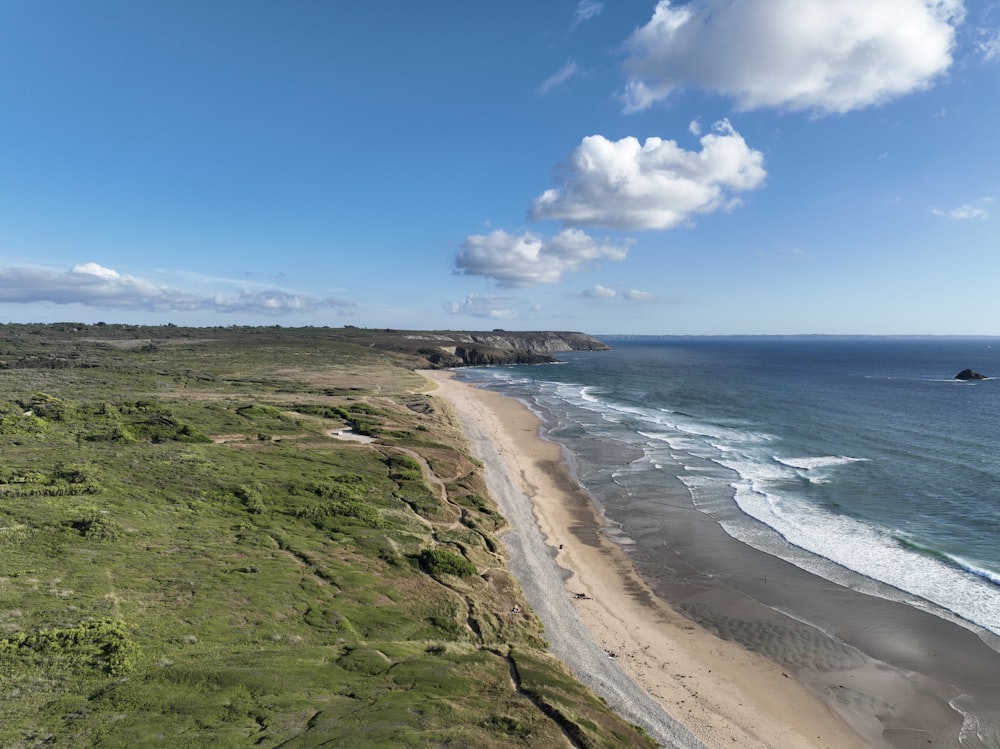 a beach with a body of water