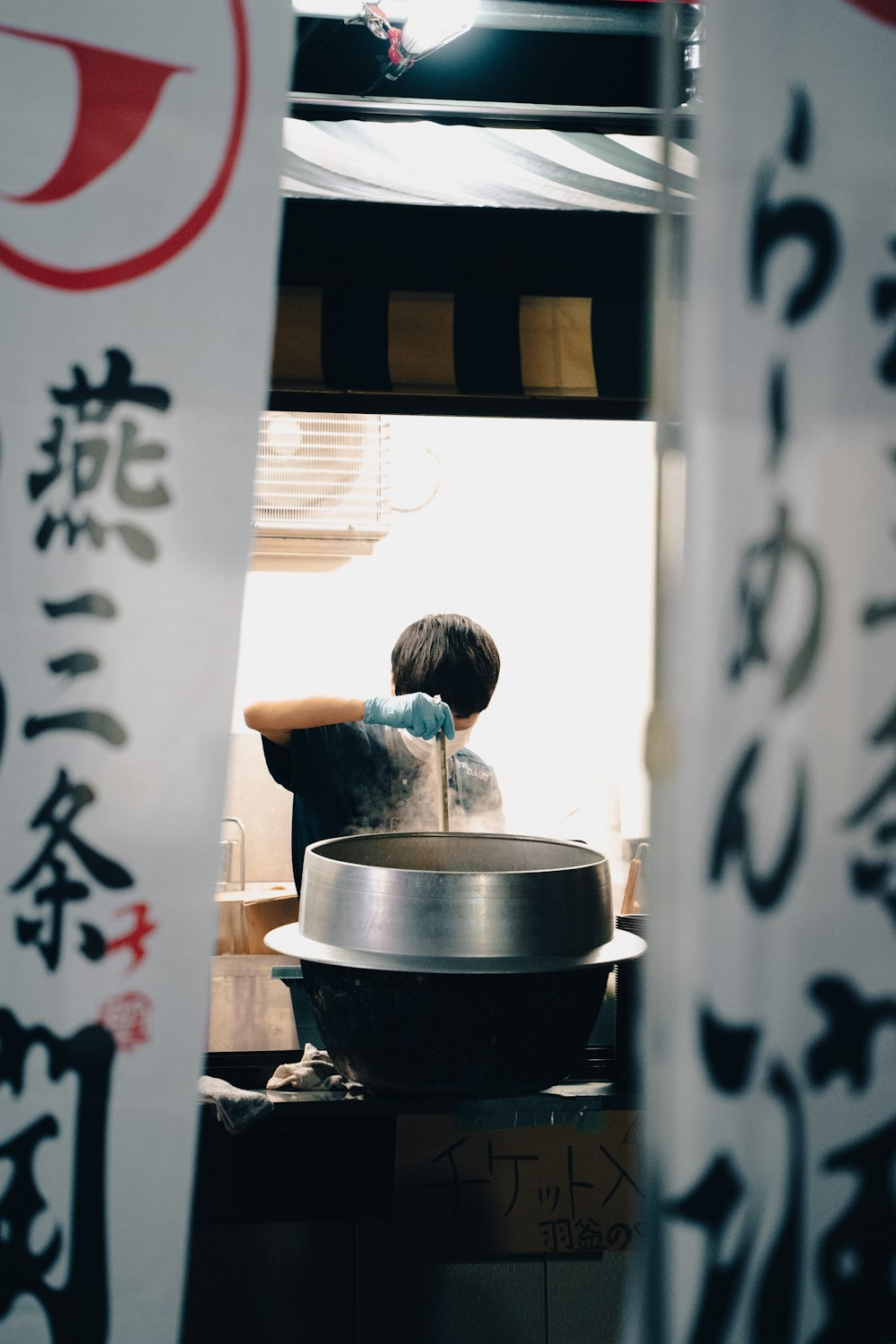 a boy cooking in a kitchen
