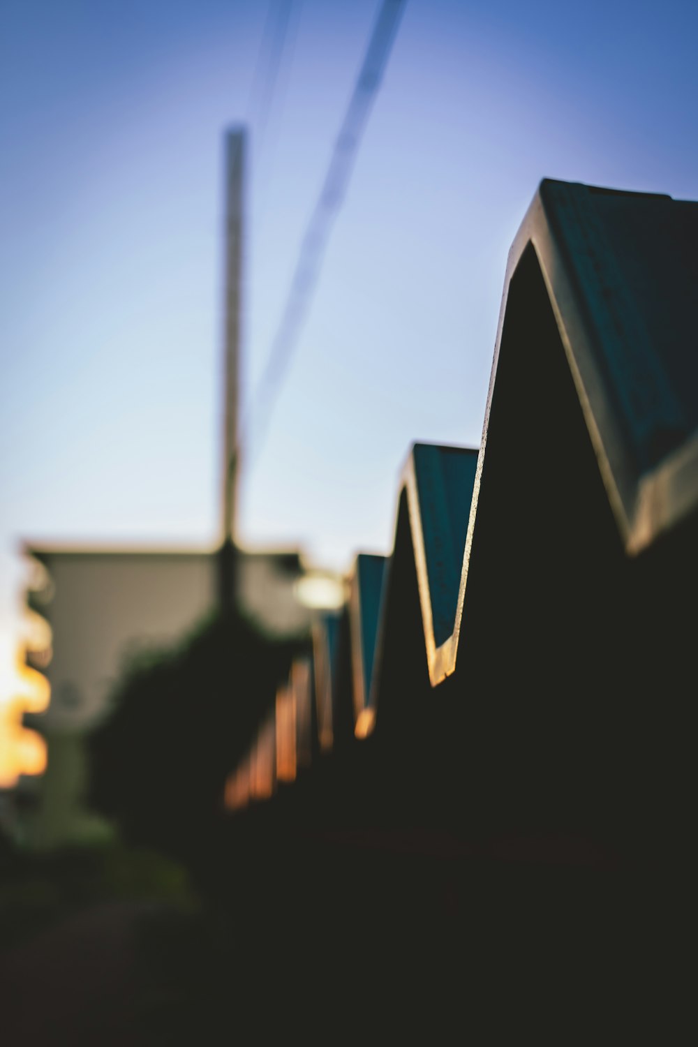 a few buildings with a tall antenna