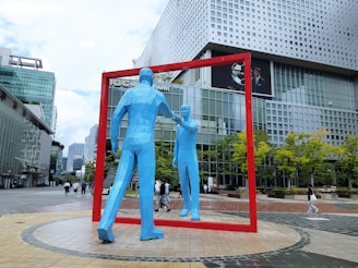 a group of people in blue clothing