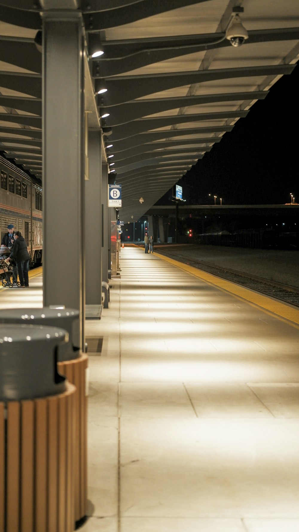 a train station with people