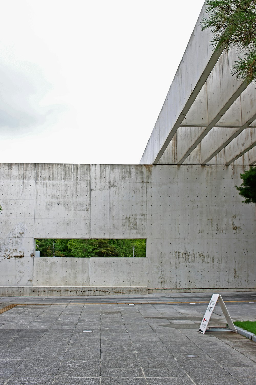 a concrete wall with a cement wall