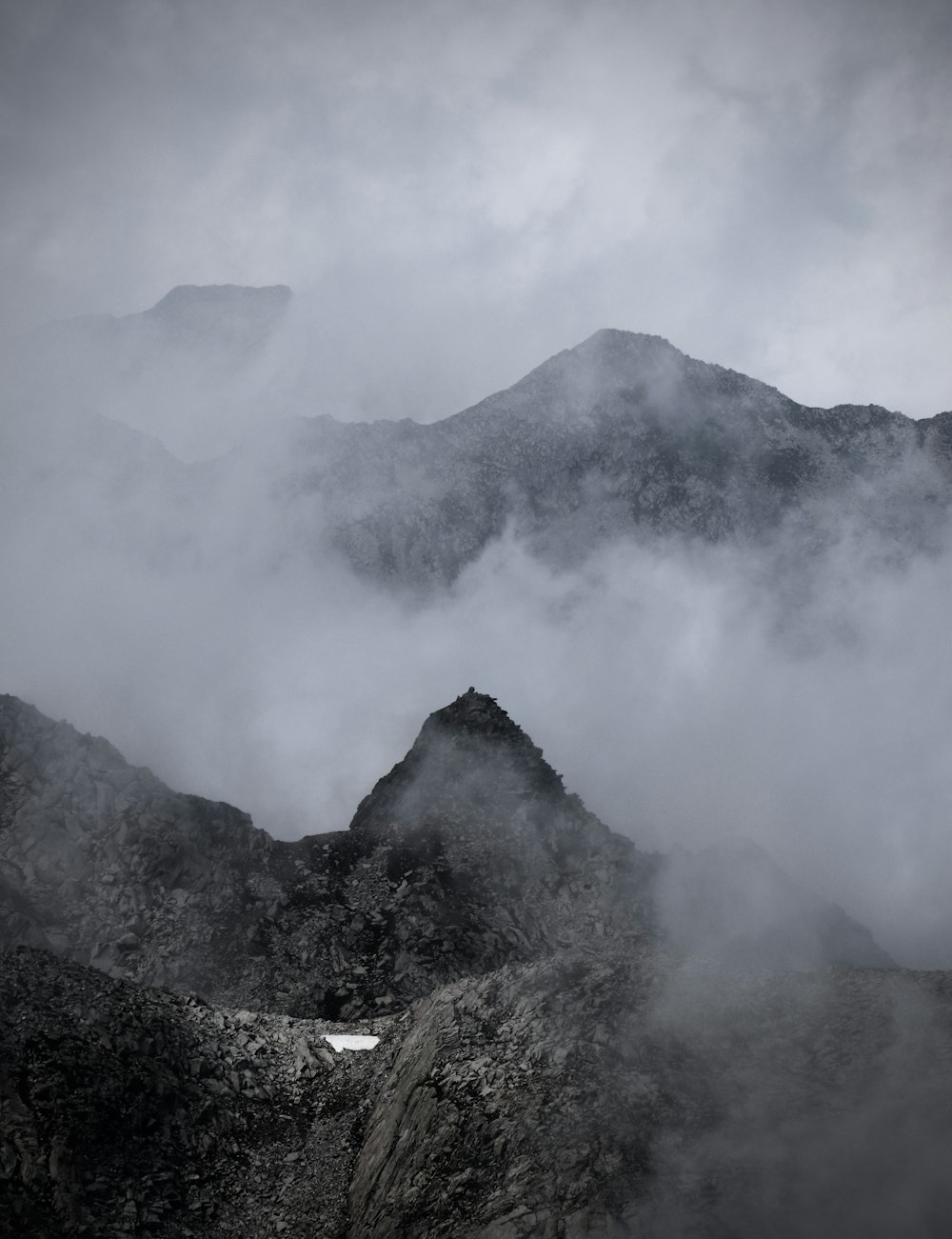 a mountain with clouds