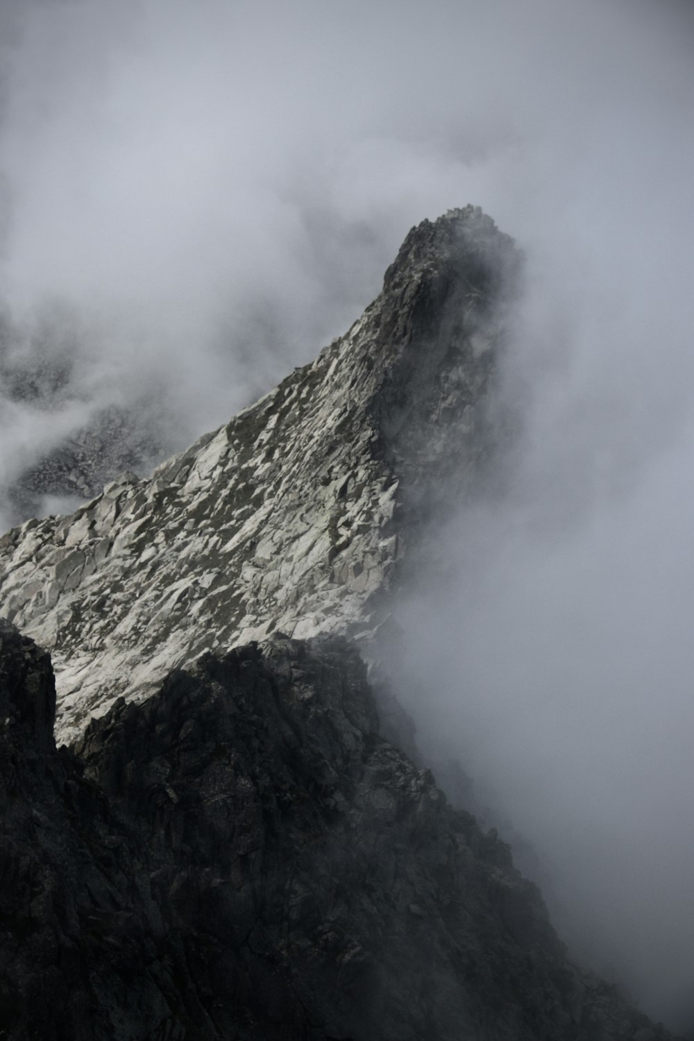 a mountain with fog