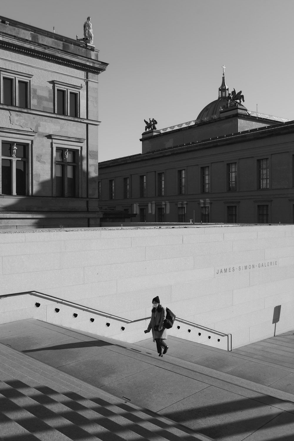 a person walking on a stone walkway