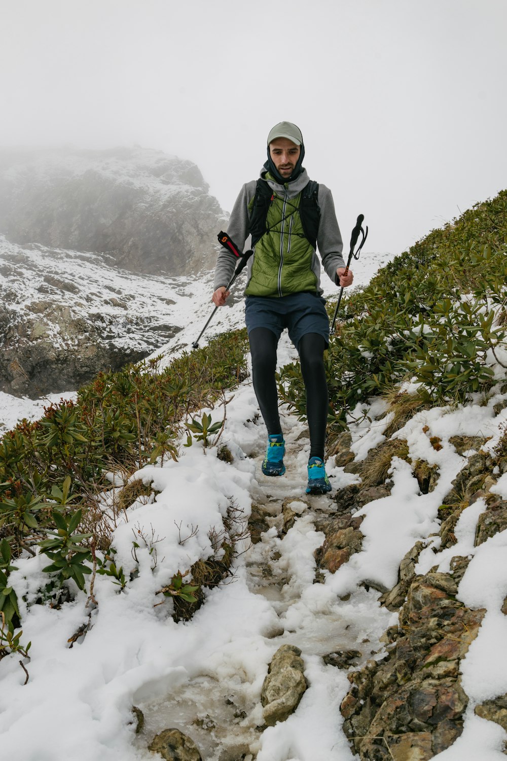 a man standing on a snowy mountain