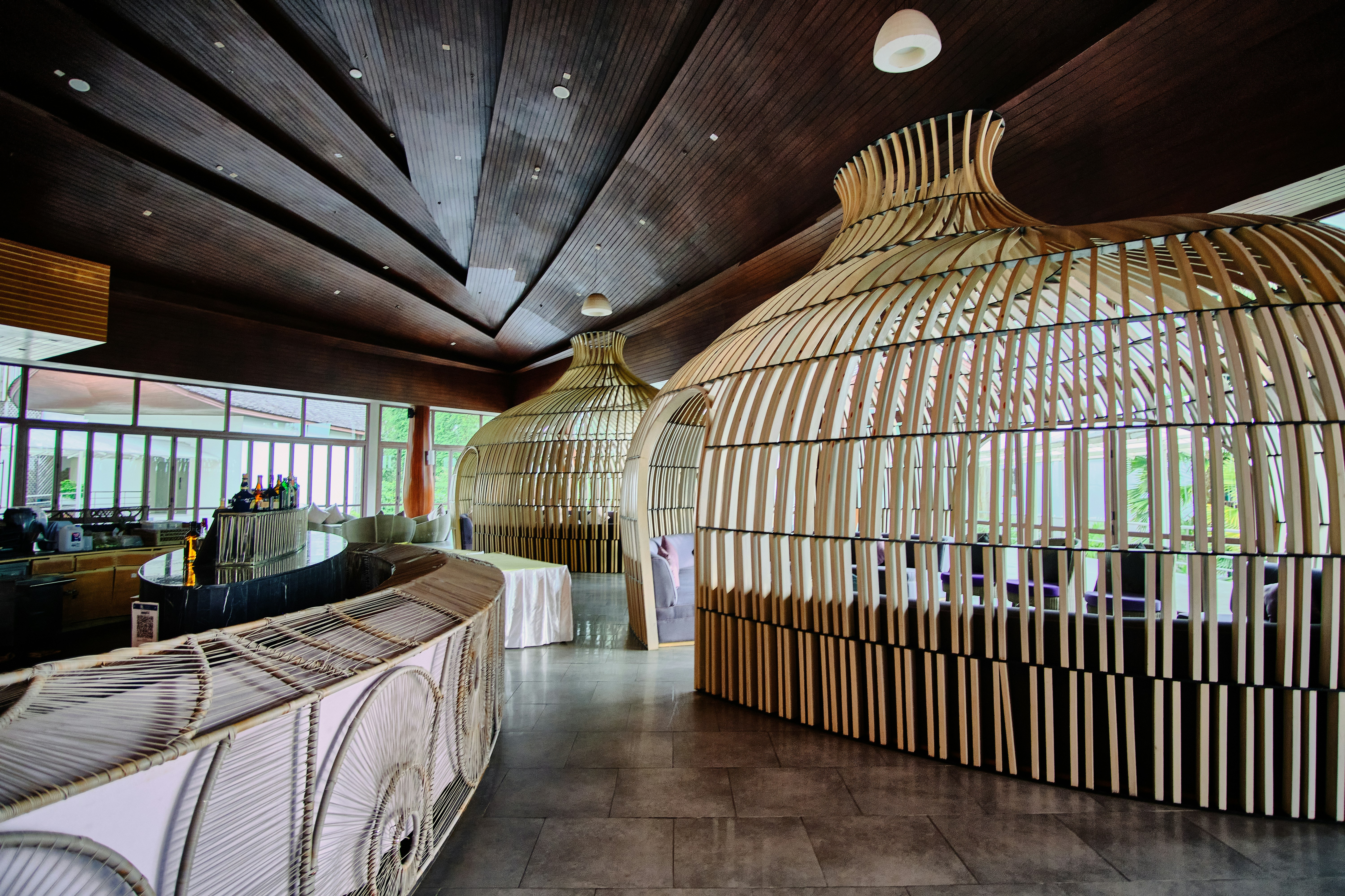 a room with a large wooden wall