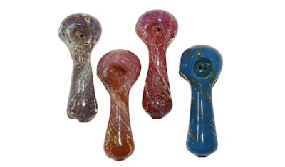 Four colorful glass pipes with intricate designs and varied patterns. They are arranged on a plain background, each displaying unique color schemes such as blue, red, and orange with swirls and speckles.