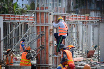 a group of workers in a construction site