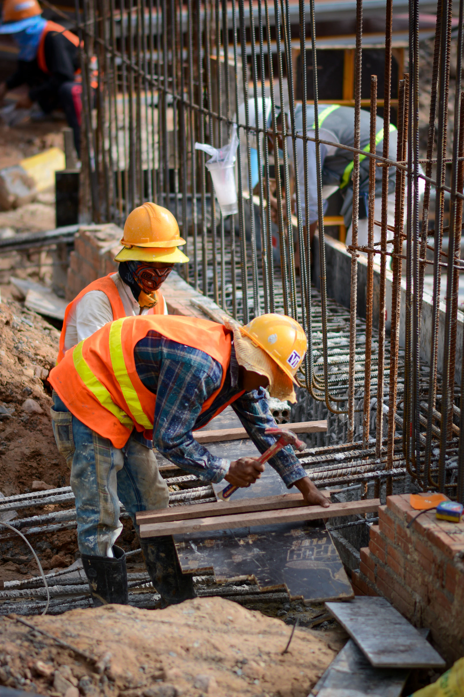 Workers in hard hats on a construction site
