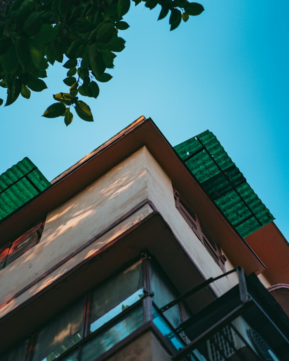 a building with a tree in the front