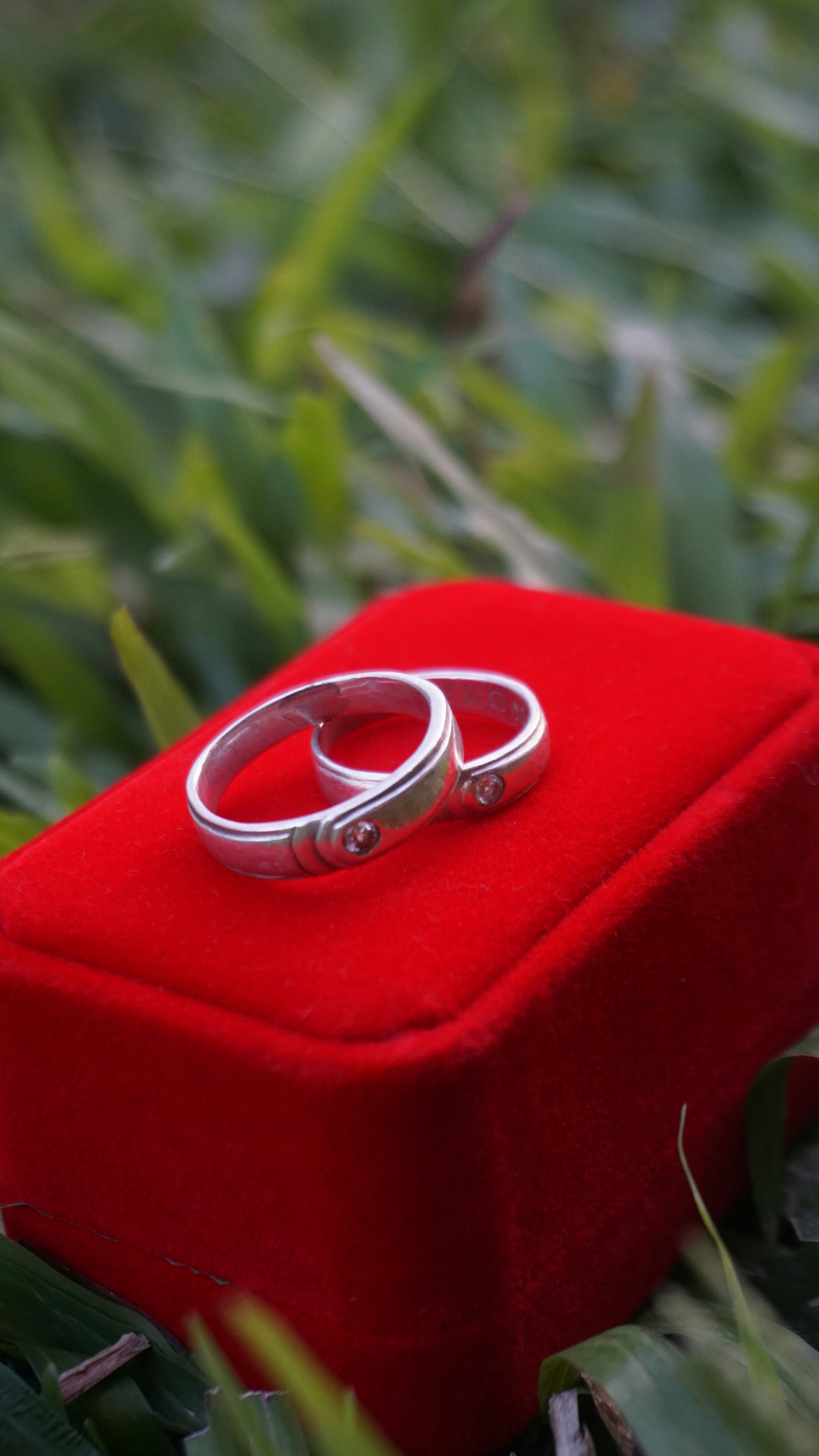 a red object with a ring on it