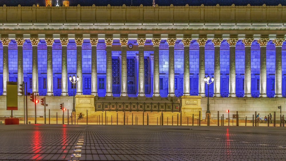 a large room with a large group of blue and white pillars